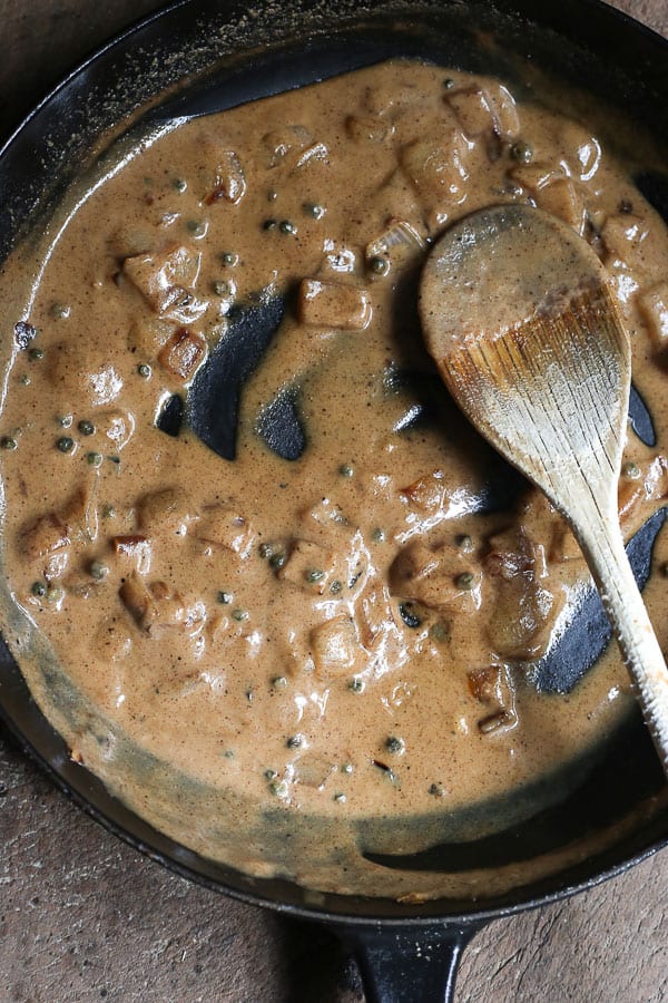 a pan of dairy-free peppercorn sauce